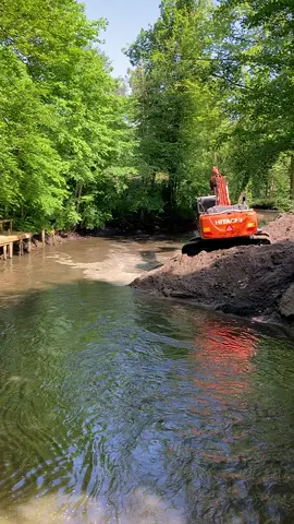 Opgravning af sand i Odense å